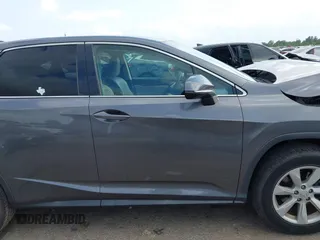 2016 Lexus RX 350 z VIN 2T2ZZMCA4GC032034, wystawiony jako IAAI lot #42095974 z przebiegiem 57 195 mil mil oraz . Historia ofert i sprzedaży dostępna na DreamBid. Obrazek 13.