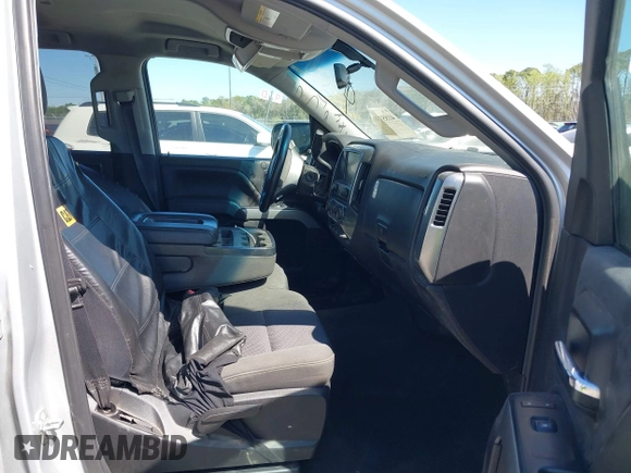 2018 Chevrolet Silverado 1500 LT with VIN 1GCVKREC9JZ335603, listed as a IAAI auction lot 41853399 with 152,460 mi miles and . Bid and sale history available at DreamBid. Image 5.