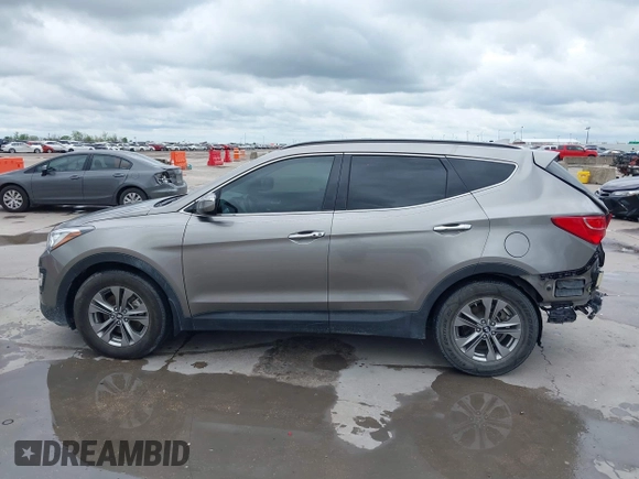 2014 Hyundai Santa Fe with VIN 5XYZU3LB2EG155127, listed as a IAAI auction lot 41864518 with Not provided miles and . Bid and sale history available at DreamBid. Image 15.