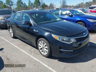 2016 Kia Optima LX with VIN 5XXGT4L3XGG013835, listed as a IAAI auction lot 41815349 with 120,628 mi miles. Bid and sale history available at carsss.com. Image 1.