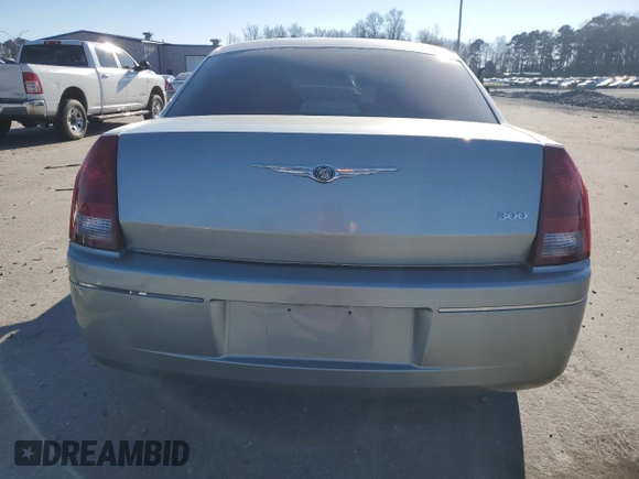 2005 Chrysler 300 with VIN 2C3JA43R95H168570, listed as a Copart auction lot 87672695 with 82,171 mi miles and Salvage Title. Bid and sale history available at carsss.com. Image 6.