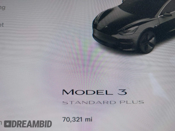 2019 Tesla Model 3 Mid Range with VIN 5YJ3E1EA2KF362048, listed as a IAAI auction lot 40141734 with 70,321 mi miles and . Bid and sale history available at carsss.com. Image 14.