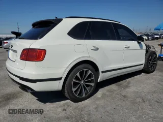 2018 Bentley Bentayga Signature z VIN SJAAC2ZV3JC016779, wystawiony jako Copart lot #54077865 z przebiegiem Nie podano mil oraz Szkoda całkowita • Salvage title. Historia ofert i sprzedaży dostępna na DreamBid. Obrazek 3.