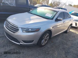 2015 Ford Taurus SEL with VIN 1FAHP2E84FG189640, listed as a IAAI auction lot 41814795 with 100,209 mi miles and . Bid and sale history available at DreamBid. Image 2.