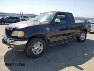 2000 Ford F-150 XL с VIN 1FTRX18W4YKA22648, выставлен на аукционе Copart как лот 59339975 с пробегом 446 061 миль миль и Списание • Salvage title. История ставок и продаж доступна на DreamBid. Изображение 1.