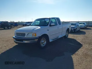 1998 Ford F-150 with VIN 1FTZX17W3WKB43668, listed as a IAAI auction lot 41243322 with 154,780 mi miles and . Bid and sale history available at DreamBid. Image 2.