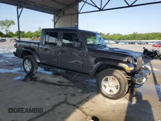 2022 Jeep Gladiator Texas Trail with VIN 1C6HJTAG5NL121505, listed as a Copart auction lot 57037625 with 55,091 mi miles and Salvage title. Bid and sale history available at DreamBid. Image 4.
