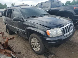 2004 Jeep Grand Cherokee Limited with VIN 1J8GW58J34C363977, listed as a Copart auction lot 61049485 with 162,329 mi miles and Salvage title. Bid and sale history available at DreamBid. Image 4.