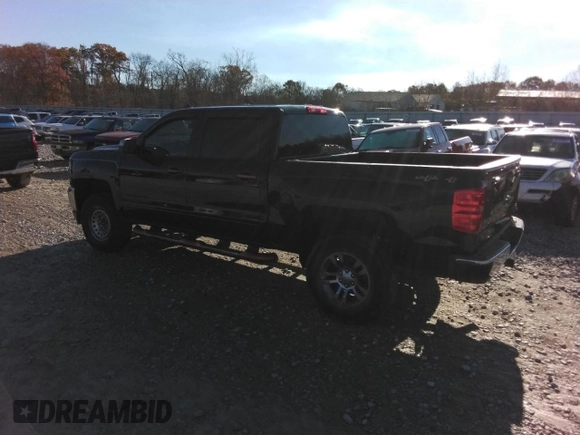 2017 Chevrolet Silverado 1500 LT with VIN 3GCUKREC0HG493446, listed as a Copart auction lot 79068394 with 99,753 mi miles and Salvage Title. Bid and sale history available at DreamBid. Image 2.