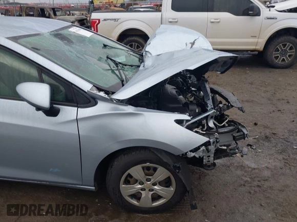 2018 Chevrolet Cruze LS with VIN 1G1BC5SMXJ7197516, listed as a IAAI auction lot 41033980 with 124,058 mi miles and . Bid and sale history available at DreamBid. Image 17.