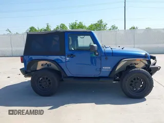 2010 Jeep Wrangler Sport with VIN 1J4AA2D11AL117404, listed as a IAAI auction lot 42012340 with 266,310 mi miles and . Bid and sale history available at carsss.com. Image 13.