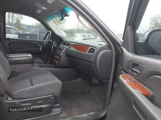 2009 Chevrolet Tahoe 2LT z VIN 1GNFK23009R296956, wystawiony jako IAAI lot #42143854 z przebiegiem 162 156 mil mil oraz . Historia ofert i sprzedaży dostępna na DreamBid. Obrazek 5.