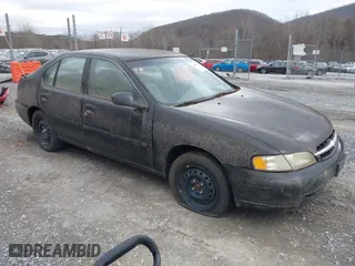1999 Nissan Altima XE with VIN 1N4DL01DXXC148729, listed as a IAAI auction lot 41697641 with 187,596 mi miles. Bid and sale history available at carsss.com. Image 1.