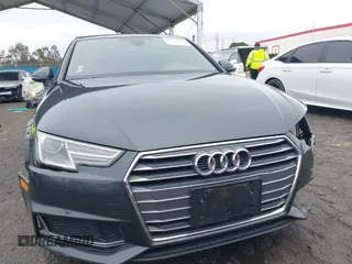 2019 Audi A4 Premium z VIN WAUGMAF44KA060327, wystawiony jako IAAI lot #41757099 z przebiegiem 52 110 mil mil oraz . Historia ofert i sprzedaży dostępna na DreamBid. Obrazek 13.