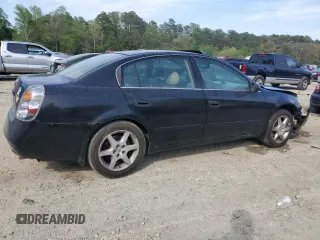 2004 Nissan Altima SE z VIN 1N4BL11E24C153716, wystawiony jako Copart lot #54332265 z przebiegiem 203 330 mil mil oraz Szkoda całkowita • Salvage title. Historia ofert i sprzedaży dostępna na DreamBid. Obrazek 3.