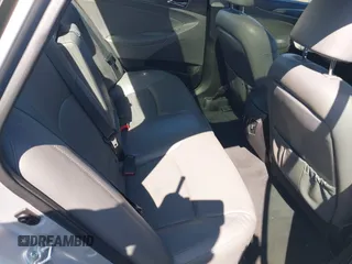 2012 Hyundai Sonata Hybrid z VIN KMHEC4A42CA054710, wystawiony jako IAAI lot #41871775 z przebiegiem Nie podano mil oraz . Historia ofert i sprzedaży dostępna na DreamBid. Obrazek 8.