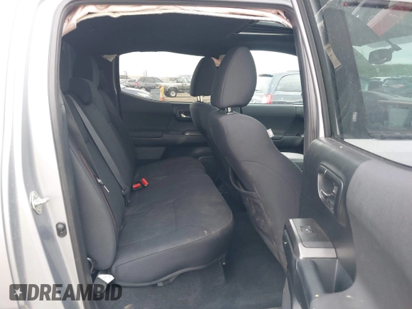 2017 Toyota Tacoma SR5 with VIN 3TMCZ5AN8HM051829, listed as a IAAI auction lot 41616329 with 64,113 mi miles and . Bid and sale history available at DreamBid. Image 8.