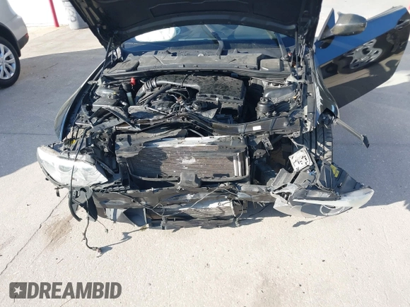 2012 BMW 3 Series 335i with VIN WBAKG7C50CE803402, listed as a IAAI auction lot 41531322 with 111,375 mi miles and . Bid and sale history available at DreamBid. Image 6.