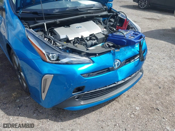 2022 Toyota Prius L Eco with VIN JTDKAMFU5N3165006, listed as a IAAI auction lot 41753470 with 33,567 mi miles. Bid and sale history available at carsss.com. Image 6.
