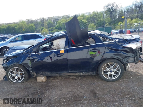 2016 Ford Focus Titanium with VIN 1FADP3J22GL242818, listed as a IAAI auction lot 42177015 with Not provided miles and . Bid and sale history available at DreamBid. Image 14.