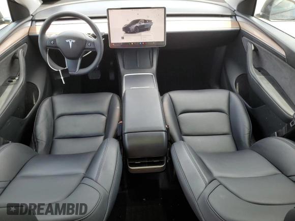 2024 Tesla Model Y Long Range with VIN 7SAYGAEE5RF088151, listed as a Copart auction lot 52651015 with 6,185 mi miles and Clean title. Bid and sale history available at DreamBid. Image 8.