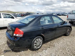 2009 Kia Spectra EX with VIN KNAFE222795620430, listed as a Copart auction lot 51170895 with 172,719 mi miles and Salvage Title. Bid and sale history available at carsss.com. Image 3.