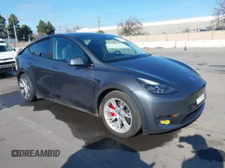 2022 Tesla Model Y Performance with VIN 7SAYGDEF3NF403775, listed as a IAAI auction lot 41447872 with 31,906 mi miles. Bid and sale history available at carsss.com. Image 1.