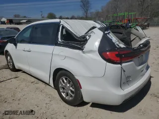 2024 Chrysler Pacifica Touring L with VIN 2C4RC1BG3RR114088, listed as a Copart auction lot 50728045 with 6,696 mi miles and Salvage Title. Bid and sale history available at carsss.com. Image 2.