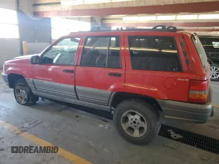 1997 Jeep Grand Cherokee Laredo with VIN 1J4GZ58SXVC723703, listed as a Copart auction lot 89216845 with 247,398 mi miles and Clean Title. Bid and sale history available at carsss.com. Image 2.
