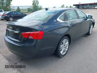 2014 Chevrolet Impala LS with VIN 1G11X5SL0EU164667, listed as a IAAI auction lot 42542110 with 150,458 mi miles and . Bid and sale history available at DreamBid. Image 4.