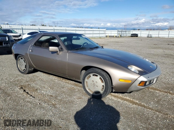 1984 Porsche 928 z VIN WP0JB0920ES860222, wystawiony jako Copart lot #44055645 z przebiegiem 166 689 mil mil oraz Nie do naprawy. Historia ofert i sprzedaży dostępna na DreamBid. Obrazek 4.