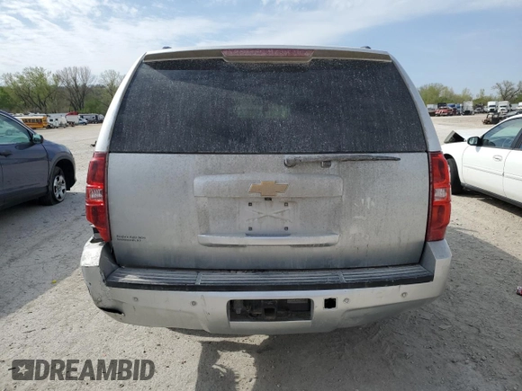 2014 Chevrolet Suburban LT with VIN 1GNSKJE7XER225339, listed as a Copart auction lot 53318195 with 207,134 mi miles and Salvage Title. Bid and sale history available at DreamBid. Image 6.