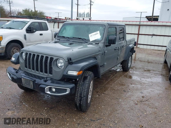 2023 Jeep Gladiator Sport S z VIN 1C6HJTAG3PL523140, wystawiony jako IAAI lot #41719004 z przebiegiem 34 014 mil mil oraz . Historia ofert i sprzedaży dostępna na DreamBid. Obrazek 2.