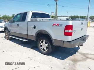 2005 Ford F-150 XLT with VIN 1FTPX14565KC84798, listed as a IAAI auction lot 42064262 with 149,534 mi miles. Bid and sale history available at carsss.com. Image 3.