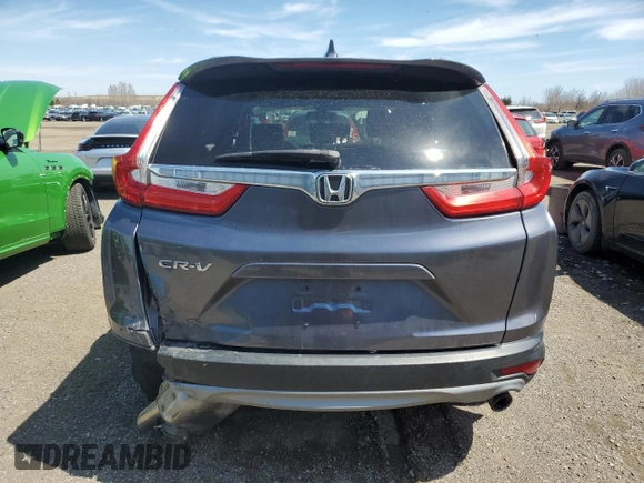 2019 Honda CR-V Touring with VIN 2HKRW2H90KH149664, listed as a Copart auction lot 52019525 with 147,649 mi miles and Salvage Title. Bid and sale history available at DreamBid. Image 6.