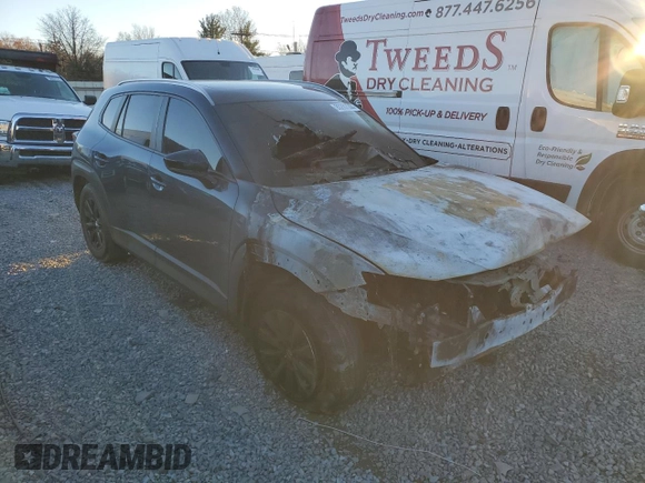 2023 Mazda CX-50 S Preferred Plus with VIN 7MMVABCM7PN117973, listed as a Copart auction lot 80282244 with Not Provided miles and Salvage Title. Bid and sale history available at DreamBid. Image 4.