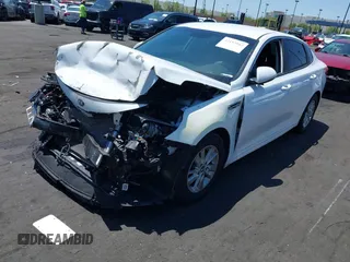 2016 Kia Optima LX z VIN 5XXGT4L37GG026140, wystawiony jako IAAI lot #42153942 z przebiegiem 128 919 mil mil oraz . Historia ofert i sprzedaży dostępna na DreamBid. Obrazek 2.