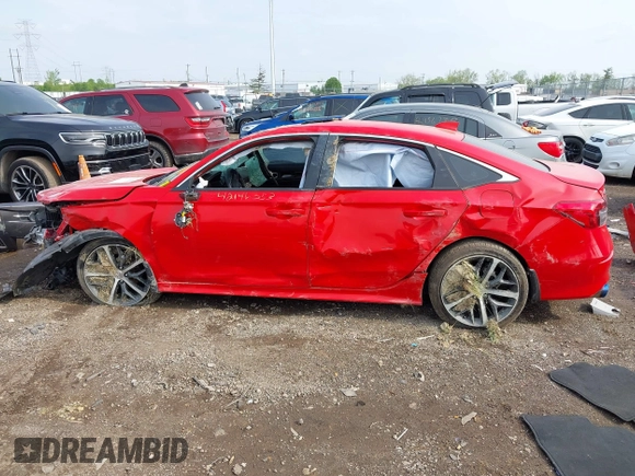 2023 Honda Civic Touring z VIN 2HGFE1F90PH309059, wystawiony jako IAAI lot #42146353 z przebiegiem Nie podano mil oraz . Historia ofert i sprzedaży dostępna na DreamBid. Obrazek 14.