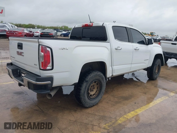 2018 GMC Canyon 4WD SLT with VIN 1GTP6DE18J1111056, listed as a IAAI auction lot 41903405 with 99,280 mi miles. Bid and sale history available at carsss.com. Image 4.