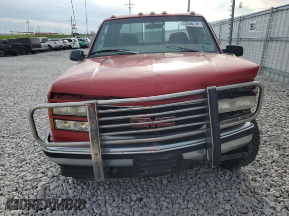 1999 GMC Sierra 2500 z VIN 1GTGK29R3XF020000, wystawiony jako Copart lot #53698755 z przebiegiem 241 366 mil mil oraz Szkody całkowita. Historia ofert i sprzedaży dostępna na DreamBid. Obrazek 5.