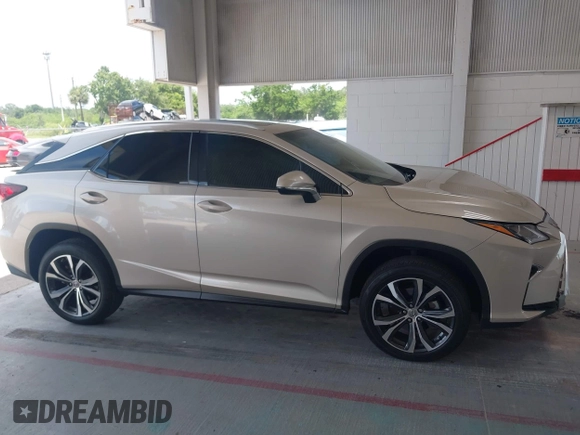 2016 Lexus RX 350 z VIN 2T2ZZMCA7GC026812, wystawiony jako IAAI lot #42470092 z przebiegiem 49 426 mil mil oraz . Historia ofert i sprzedaży dostępna na DreamBid. Obrazek 13.