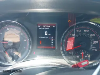 2014 Dodge Charger SXT with VIN 2C3CDXHG0EH180681, listed as a IAAI auction lot 41868514 with 187,872 mi miles. Bid and sale history available at carsss.com. Image 7.
