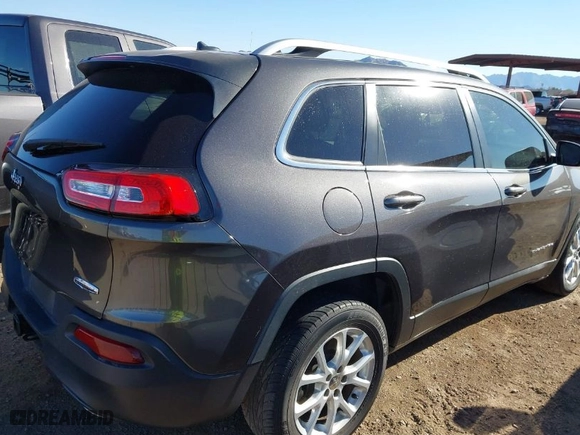2014 Jeep Cherokee Latitude with VIN 1C4PJLCS3EW155236, listed as a IAAI auction lot 41877793 with 106,370 mi miles. Bid and sale history available at carsss.com. Image 4.