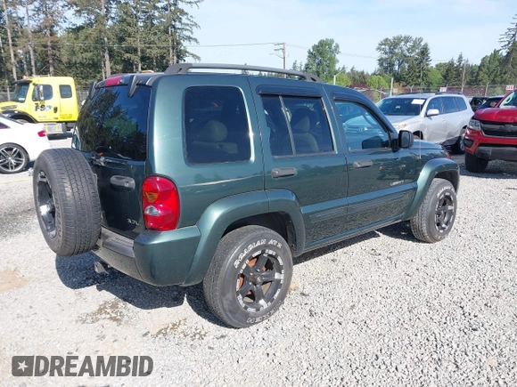 2002 Jeep Liberty Limited z VIN 1J8GL58KX2W327605, wystawiony jako IAAI lot #42217110 z przebiegiem 178 200 mil mil oraz . Historia ofert i sprzedaży dostępna na DreamBid. Obrazek 4.