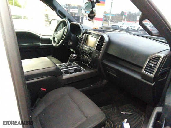 2015 Ford F-150 XLT w/HD Payload Pkg with VIN 1FTFW1EG8FFA12438, listed as a IAAI auction lot 41743982 with 174,799 mi miles. Bid and sale history available at carsss.com. Image 5.