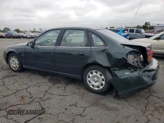 2001 Saturn LS z VIN 1G8JU54F41Y581083, wystawiony jako Copart lot #73123714 z przebiegiem 98 500 mil mil oraz Szkody całkowita. Historia ofert i sprzedaży dostępna na DreamBid. Obrazek 2.