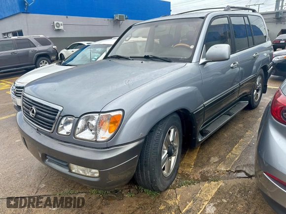 2001 Lexus LX 470 z VIN JTJHT00W313508801, wystawiony jako Copart lot #60938545 z przebiegiem 118 013 mil mil oraz Czysty tytuł • Clean title. Historia ofert i sprzedaży dostępna na DreamBid. Obrazek 2.