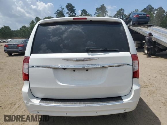 2014 Chrysler Town & Country Touring L z VIN 2C4RC1CG9ER169668, wystawiony jako Copart lot #59629895 z przebiegiem 254 421 mil mil oraz Szkoda całkowita • Salvage title. Historia ofert i sprzedaży dostępna na DreamBid. Obrazek 6.