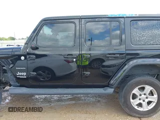 2019 Jeep Wrangler Unlimited Sahara with VIN 1C4HJXEN9KW514880, listed as a IAAI auction lot 42319437 with 70,186 mi miles and . Bid and sale history available at DreamBid. Image 15.