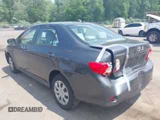 2010 Toyota Corolla with VIN JTDBU4EE8AJ074271, listed as a IAAI auction lot 42510977 with 198,709 mi miles and . Bid and sale history available at DreamBid. Image 3.